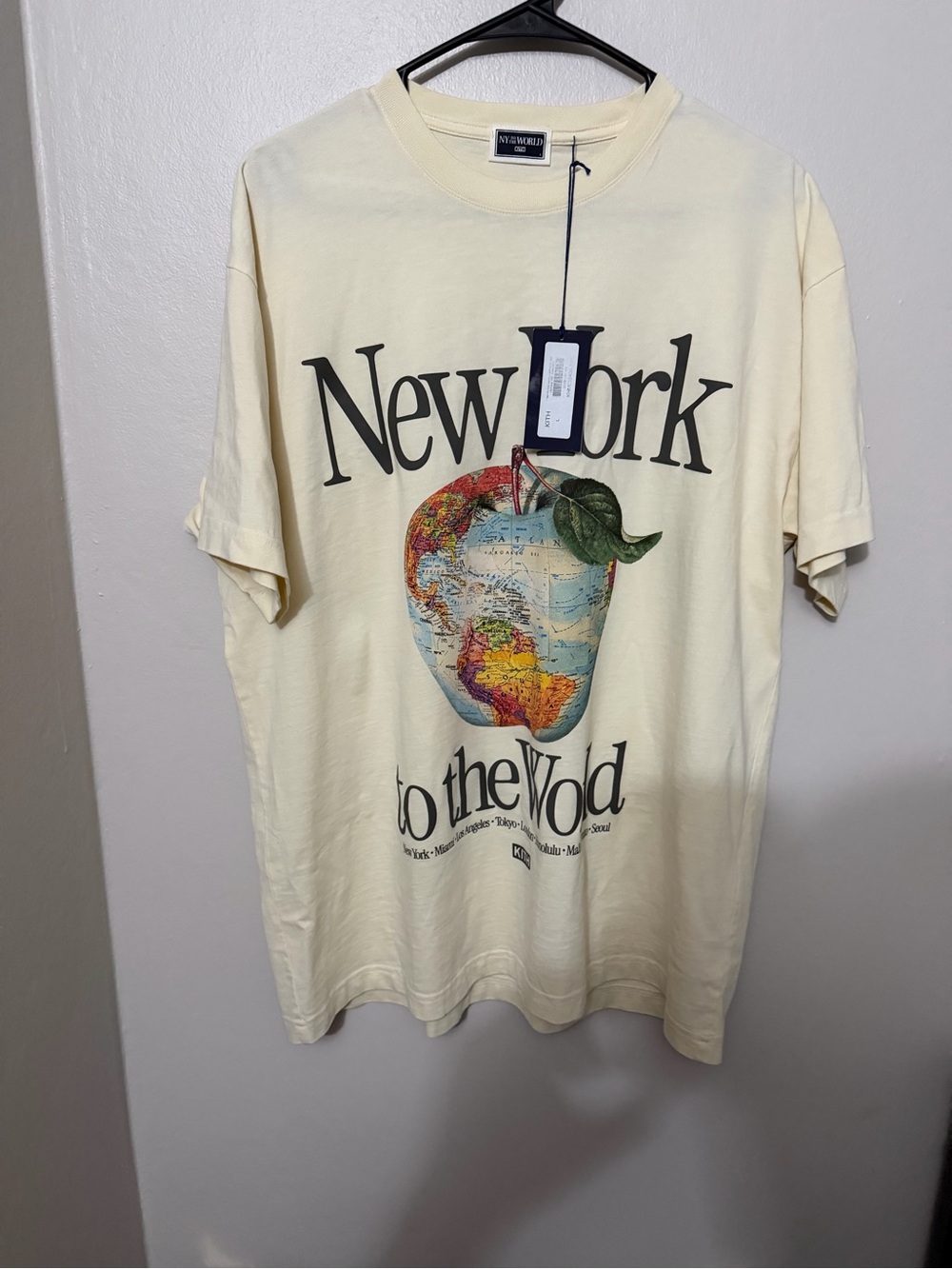 Kith Cream New York Globe Apple Graphic Short Sleeve Tee